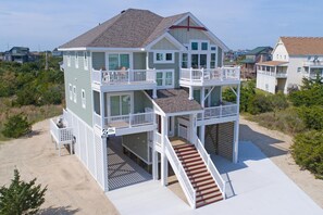 This 5-bedroom home is located a few lots from the southernmost end of Salvo with expansive views of the Cape Hatteras National Seashore.