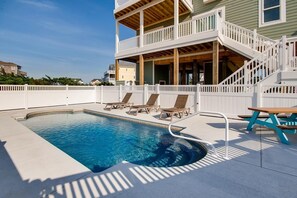 Dive into the private swimming pool, or lounge in the sun on one of the poolside chairs.