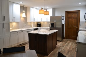 Newly remodeled kitchen with quartz countertops