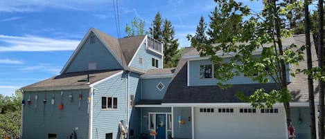 Welcome to Tree Tops House! This a view of the home when pulling into the driveway.