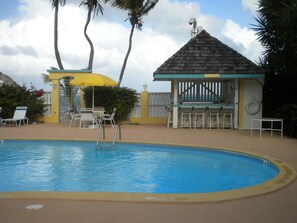 Our pool is steps from the beach. Bring down your cooler and make new friends.