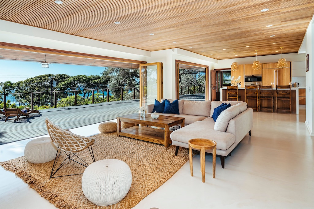 Image of an open-air living room in a villa in Hawaii, perfect for multi-generational travel.