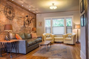 Living Area with comfortable seating and flat Screen Television