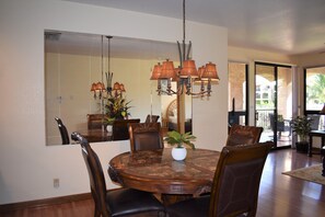 Open concept with natural light via three bay windows.