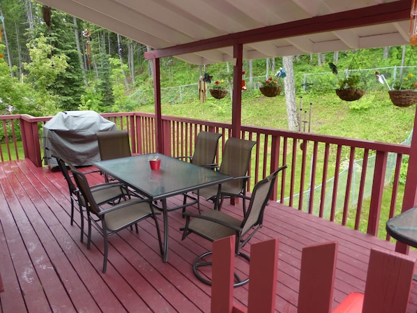 Enjoy your morning coffee or evening glass of wine on spacious deck with BBQ 