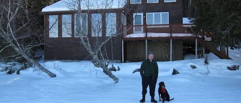 Guests in front of house in winter