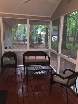 Screened porch with fan which is great for morning coffee or warm summer nights