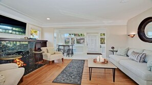 Living Room: Sofa, 2 chairs, 40" smart TV, DVD player