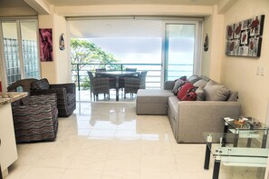 Spacious living room opens to 35 terrace overlooking Los Muertos Beach