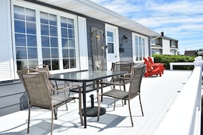 Large front deck for dining and watching the fishing boats and seabirds.