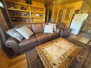 Brand New Leather queen sleeper-sofa Lazy-Boy recliner. Games/DVDs/Books.