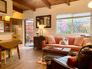 Living room to kitchen and front door