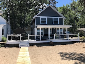 New railing and stairs with walkway to dock.