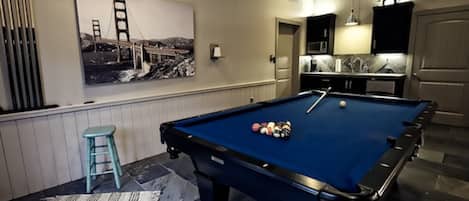Pool Table and serving bar with beverage frig