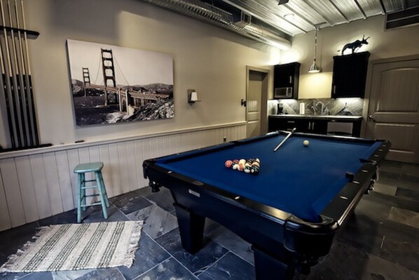 Pool Table and serving bar with beverage frig