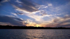 Sunset on Moonlight Bay from shoreline at cabin