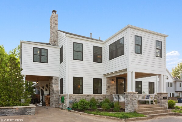 Stately corner home with inviting outdoor spaces
