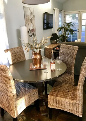 Comfortable dining area with gobs of light and ample entertaining areas.
