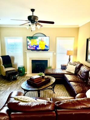 Spacious living room open to kitchen and dining 