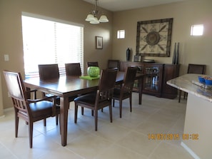 DINING AREA WITH  DINING SET THAT SEATS 8 COMFORTABLY