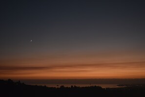 Crescent Moon Over the Ocean