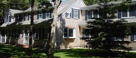 Large yard (screen porch opens to yard; 2 playhouses for young kids)