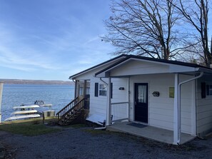 Entrance to home and screened-in porch