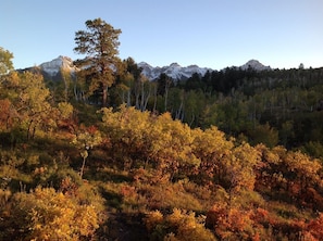 Fall color with snow capped mountains just beyond.  Easy hiking right from cabin