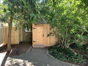 Outdoor shower in private courtyard to rinse off on your way back from the beach