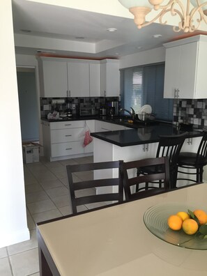 Spacious fully stocked kitchen 