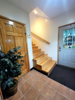 This is a second floor rental. Enter into foyer and proceed upstairs.