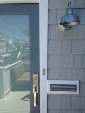 Enter the home from the front porch