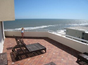 View from private deck looking out to beach