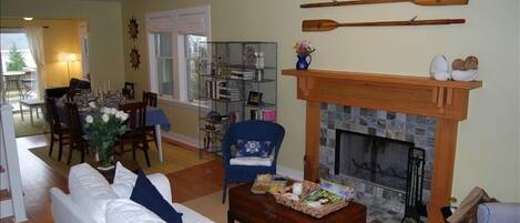 Main Floor Living and Dining Rooms with wood burning fireplace.