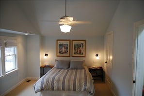 Master Bedroom with vaulted ceiling, walk-in closet & attached bath