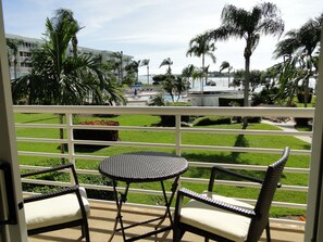 You can also see the pool from the balcony.  The beach area is just beyond.