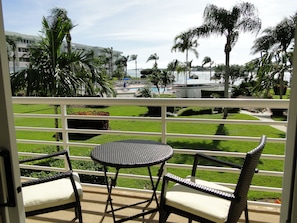 You can also see the pool from the balcony.  The beach area is just beyond.