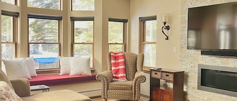 Living Room with TV and gas fireplace