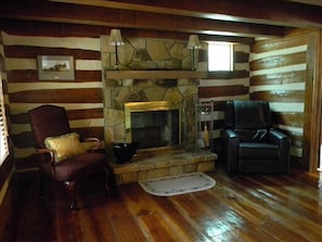 master bedroom suite with real wood burning fireplace