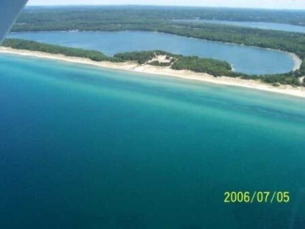 Lake Michigan and Lower Herring Lake, all private beach