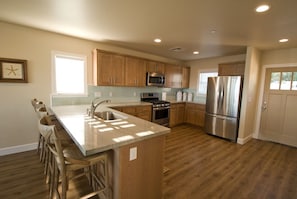 Brand new Kitchen including all new appliances, quartzite counter-top. 