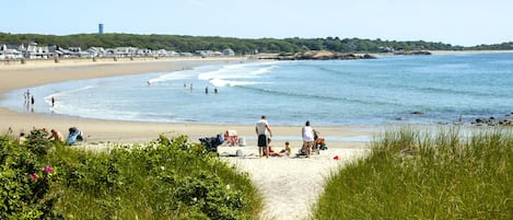 Just steps to this white sandy beach!