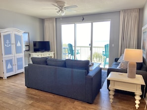 Relax with two new sofas and enjoy the beach views.