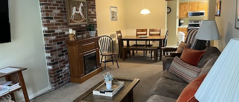 Living room and dining area from back door/deck entry. 