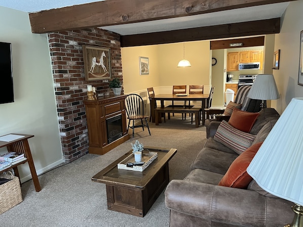 Living room and dining area from back door/deck entry. 