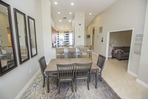 View from dining room looking through kitchen to front of condo