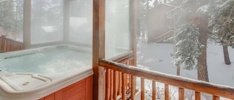 Semi-private hot tub just steps from back door, shared only with one other condo.