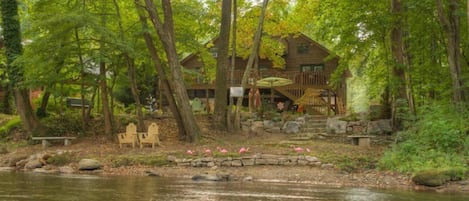 View from the other side of the river. Enjoy the natural sandy beach or fish.