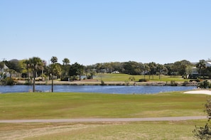 Wonderful View from the Screen Porch down the 7th Fairway toward the Water