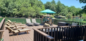 Plenty of room for all of your guests to lounge and enjoy the upper level deck.
